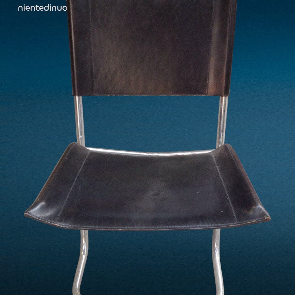 9003340 poltroncina vintage in acciaio cromato con seduta e schienale in cuoio nero anni '70