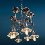 40445.jpg Lampadario vintage a doppio cono a 12 luci, periodo Space Age, funzionante e in buone condizioni generali. Presenta una leggera ossidazione sul metallo che è stata lucidata.