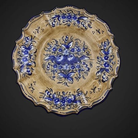 Piatto in ceramica firmato Baffoni (Gubbio)