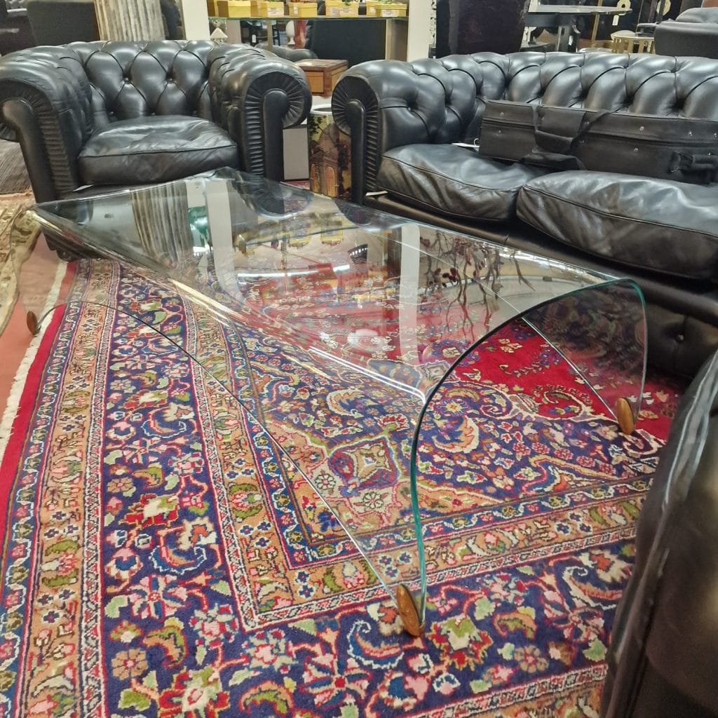 Coffee table Fiam modello Genio in vetro curvato, design firmato Iosa Ghini, in condizioni perfette