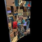 Specchio Involuto Kare Design con specchi molati su supporto in legno