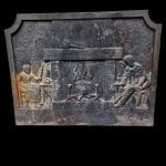 40865.jpg Vecchia piastra in ghisa da camino con soggetto antico focolare