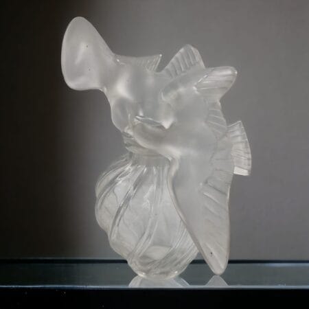 Flacone Lalique "Air de Temps" di Nina Ricci anni '60 con design in vetro soffiato