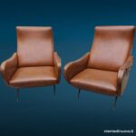41117 Coppia di poltrone Lady vintage in similpelle con piedini in ottone