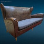 Divano vintage anni 60 in skay marrone con piedini in legno e cuscino rifatto, elegante e autentico.