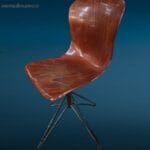 Poltroncina Pagholz vintage leggermente difettata con base regolabile in altezza e design anni ’50.