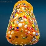 04660_4.jpg Vaso decorativo in vetro con murrine gialle, base triangolare e bocca a fiore.