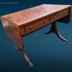 41247_2.jpg Tavolo inglese allungabile a bandelle in massello di mogano con rotelle metalliche.