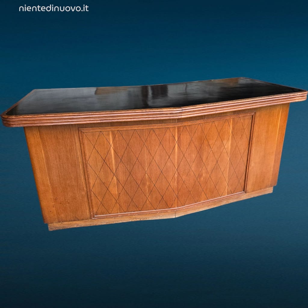41501.jpg Scrivania dirigenziale anni 60 con piano nero e frontale filettato in legno