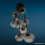 Lampadario a cascata anni 60 con diffusori in vetro fumé e struttura in ottone